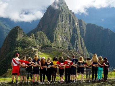 Students stood in front of a mountain